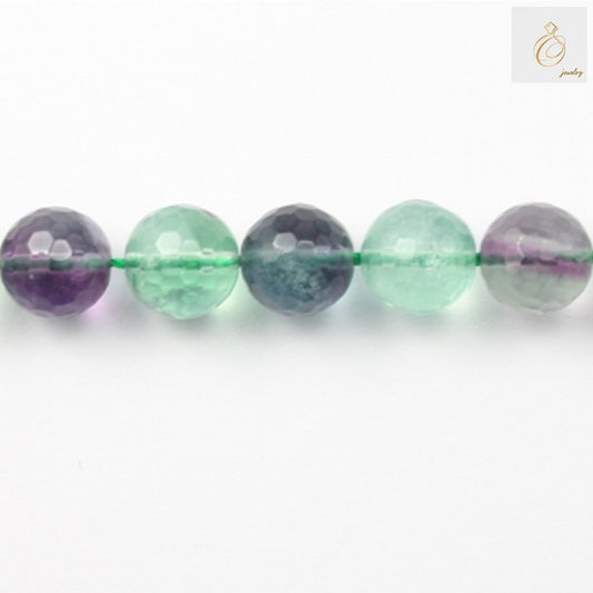 Natural fluorite faceted round beads 10mm diameter on white background"
"Close-up of translucent fluorite gemstone beads showing faceted surface"
"String of natural fluorite beads 39-40cm length for jewelry making"
"Fluorite round beads with 1.2mm holes perfect for beading projects