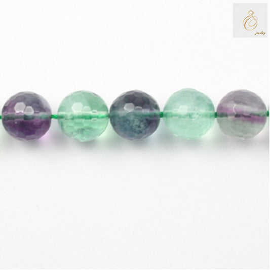 Natural fluorite faceted round beads 6mm diameter on 39cm strand"
"Purple fluorite gemstone beads with faceted cuts for jewelry making"
"Close-up of natural fluorite round beads showing clarity and color