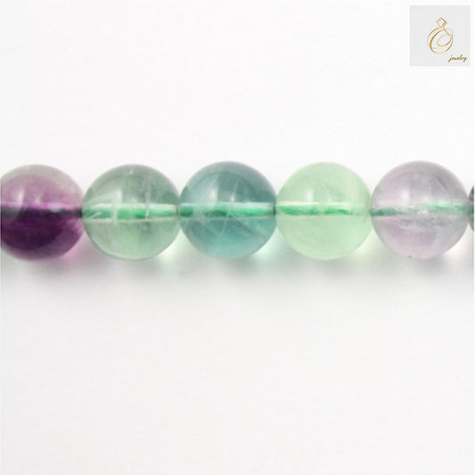 Natural fluorite round beads 6mm purple green gemstone strand 39-40cm"
"Fluorite round beads for DIY jewelry making crafts"
"Purple green fluorite gemstone beads display