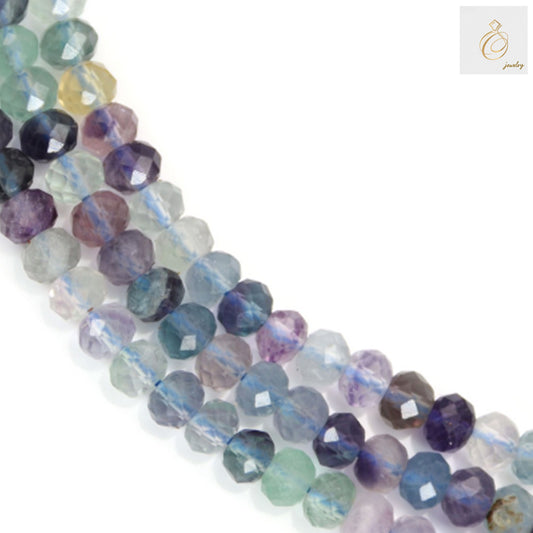 Natural fluorite faceted abacus beads 4x6mm strand showing translucent gemstone quality"