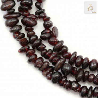 Natural garnet chips beads strand in deep red color for jewelry making"
"78-80cm strand of genuine garnet gemstone chips with irregular shapes