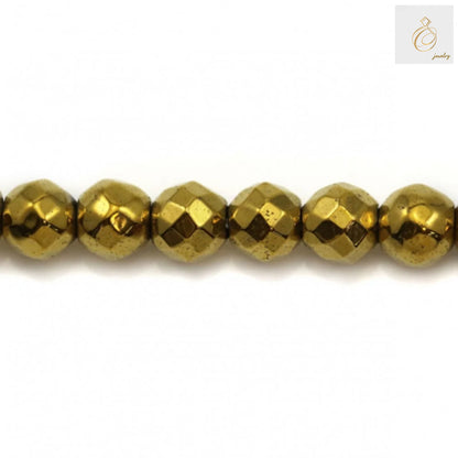 "Golden hematite faceted round beads 4mm diameter arranged on white background showing metallic luster and precision cut facets