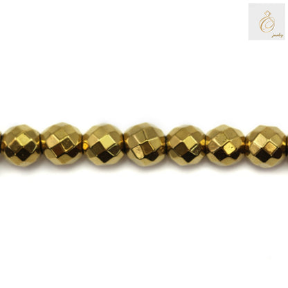 Golden hematite faceted round beads 6mm diameter showing metallic luster and uniform shape