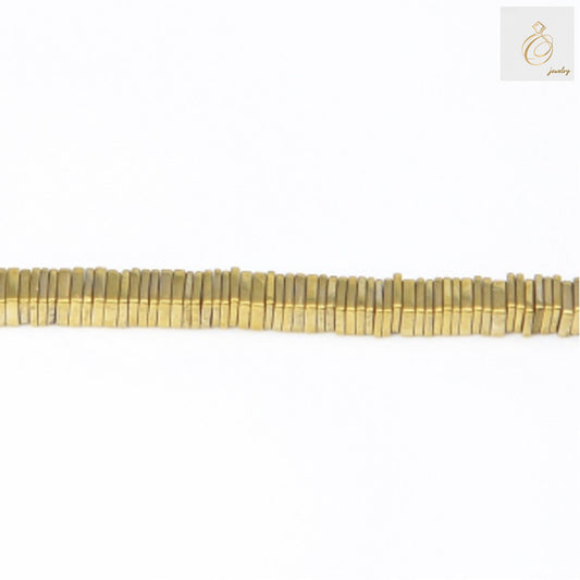 Golden hematite hexagon beads 1x2mm with metallic luster finish on white background
