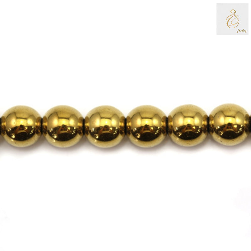 Golden hematite round beads 6mm diameter with metallic luster on white background