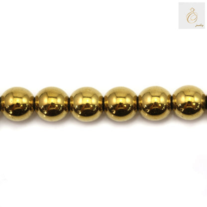 Golden hematite round beads 8mm diameter with metallic luster on white background