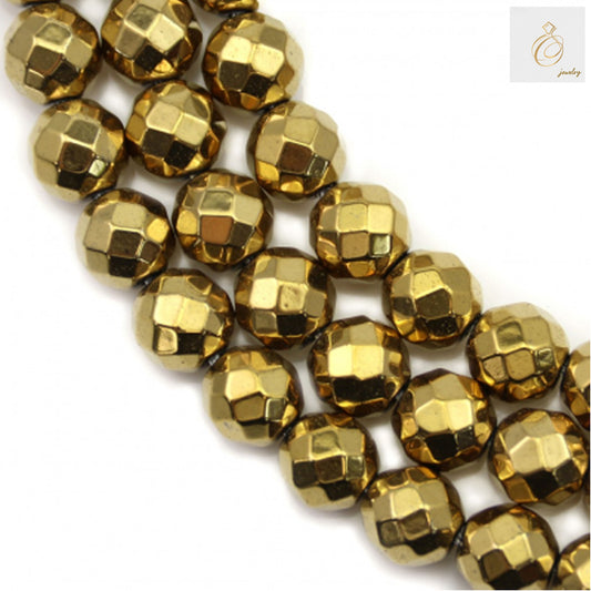 Close-up view of golden hematite beads strand displaying consistent 8mm size and brilliant golden finish
