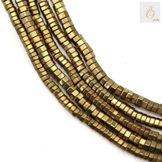 Close-up view of golden hematite hexagon beads showing uniform size and 0.8mm holes