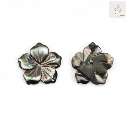 Close-up view of gray mother of pearl flower charm showing detailed craftsmanship and natural texture