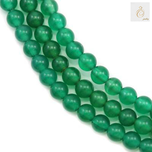 Green agate round beads 4mm on strand for jewelry making"
"Natural green agate gemstone beads 4mm diameter