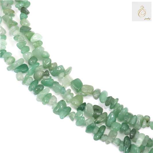 Green aventurine chip beads strand 78-80cm natural gemstone for jewelry making"
"Natural green aventurine chips on strand showing translucent green color and irregular chip shapes
