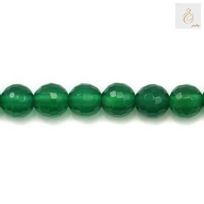 Faceted green agate round beads showing natural patterns and translucent color