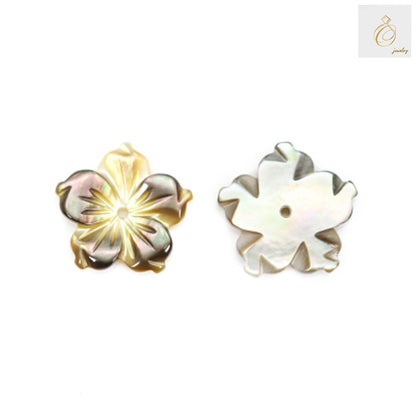 Close-up view of grey mother-of-pearl flower charm displaying texture and craftsmanship details for jewelry making