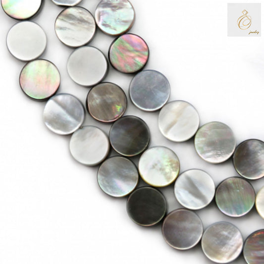 Close-up view of grey mother of pearl shell beads displaying smooth surface and 0.8mm holes for jewelry making