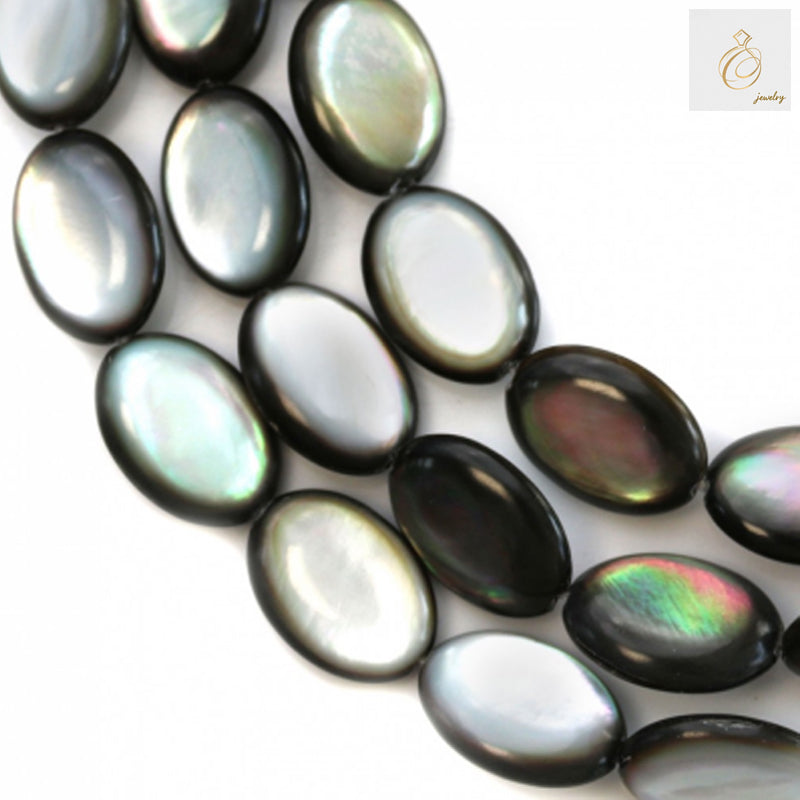 Close-up view of grey mother of pearl shell beads strand with 0.8mm holes, approximately 25 beads