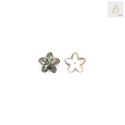 Close-up view of grey mother of pearl flower bead showing detailed 5-petal design