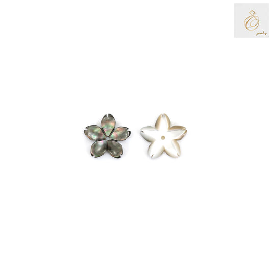 Close-up view of grey mother of pearl flower bead showing detailed 5-petal design