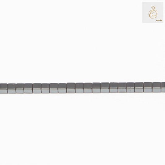 Hematite cube beads 2mm with 0.8mm holes arranged on 39-40cm strand, showing metallic luster and uniform geometric shape for jewelry making