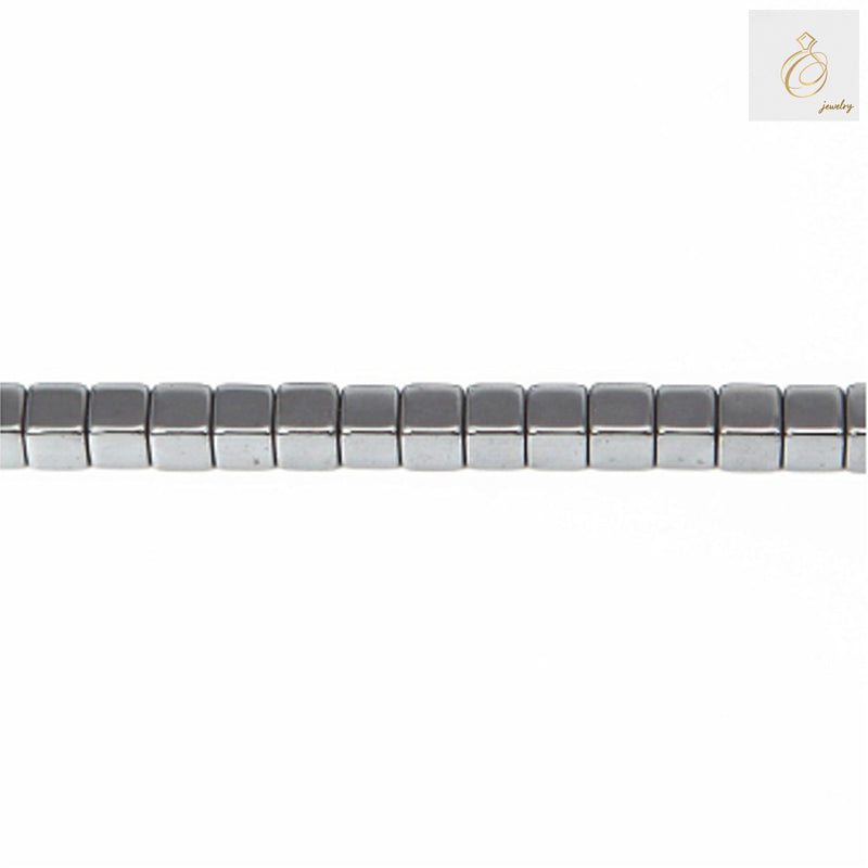 Natural hematite cube beads 4mm with metallic luster, arranged on strand showing geometric shape and dark charcoal color - perfect for jewelry making