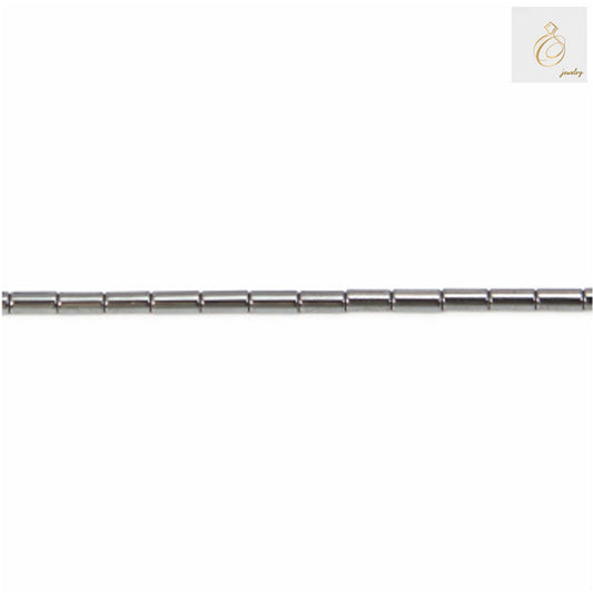 Natural hematite cylinder beads 2x4mm with metallic luster, arranged on strand for jewelry making