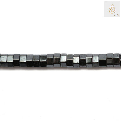 Natural hematite hexagon beads 2x1mm with metallic luster displayed on white background showing geometric shape and size