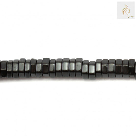 Hematite hexagon beads 3x1mm with 0.8mm holes on 39-40cm strand - close-up view showing metallic luster and uniform hexagonal shape