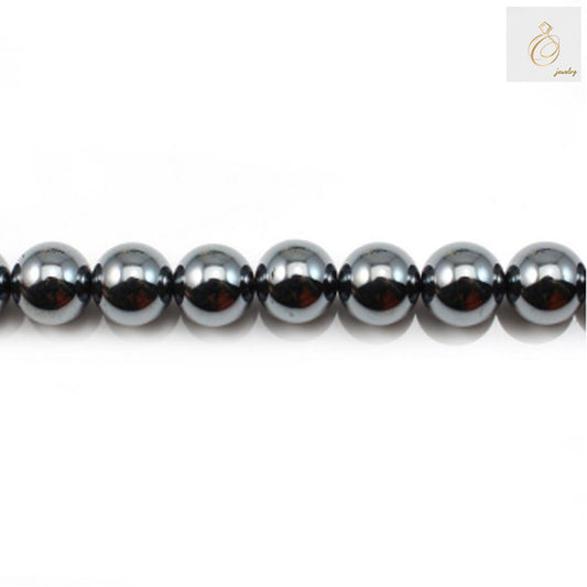 Natural hematite round beads 10mm diameter with metallic luster, arranged on strand for jewelry making