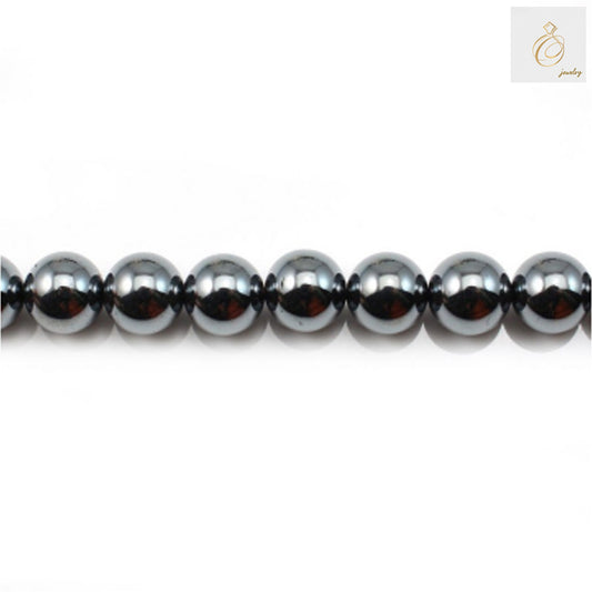 Natural hematite round beads, 12mm diameter with metallic luster, arranged on strand for jewelry making
