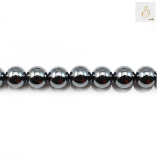 Natural hematite round beads 8mm diameter with metallic luster, arranged on strand for jewelry making