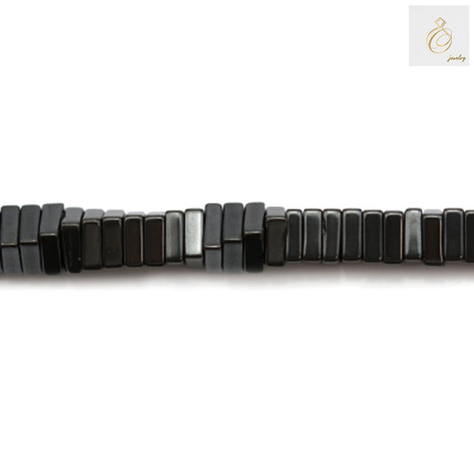 Hematite square beads 1x3mm with 0.8mm holes arranged on strand showing metallic gray finish and uniform square shape