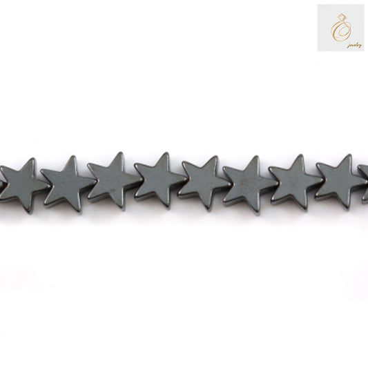 Close-up view of 6mm hematite star-shaped beads showing detailed star pattern and smooth polished surface