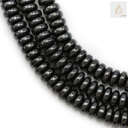 Close-up view of hematite abacus beads strand showing consistent size and quality, 39-40cm length