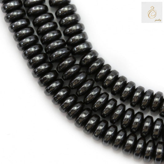 Close-up view of hematite abacus beads strand showing consistent size and quality, 39-40cm length