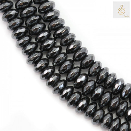 Close-up view of hematite faceted abacus beads showing detailed cut and uniform size 2x4mm