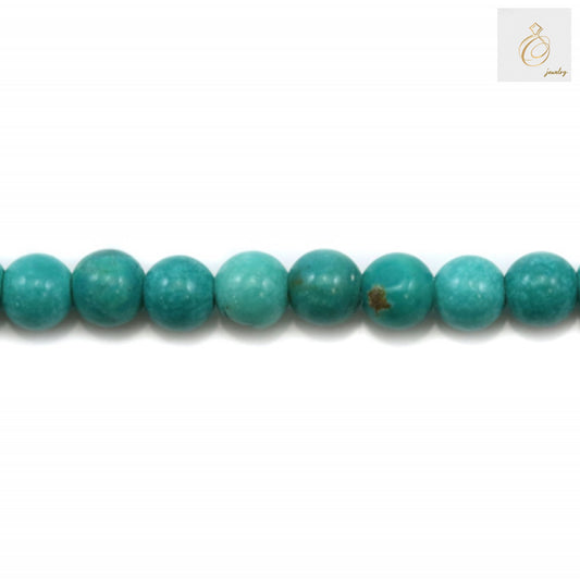 Close-up view of 3mm howlite round beads showing smooth polished surface and consistent sizing