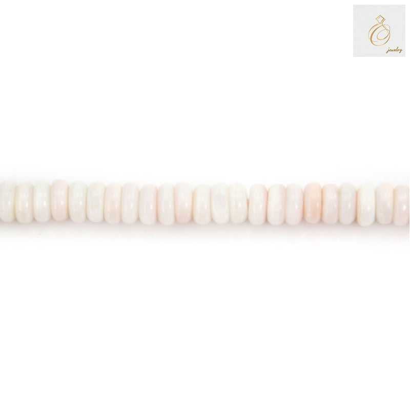 Pink Lambi shell heishi beads 2x4mm on 15.5 inch strand - close up view showing natural shell texture and soft pink color