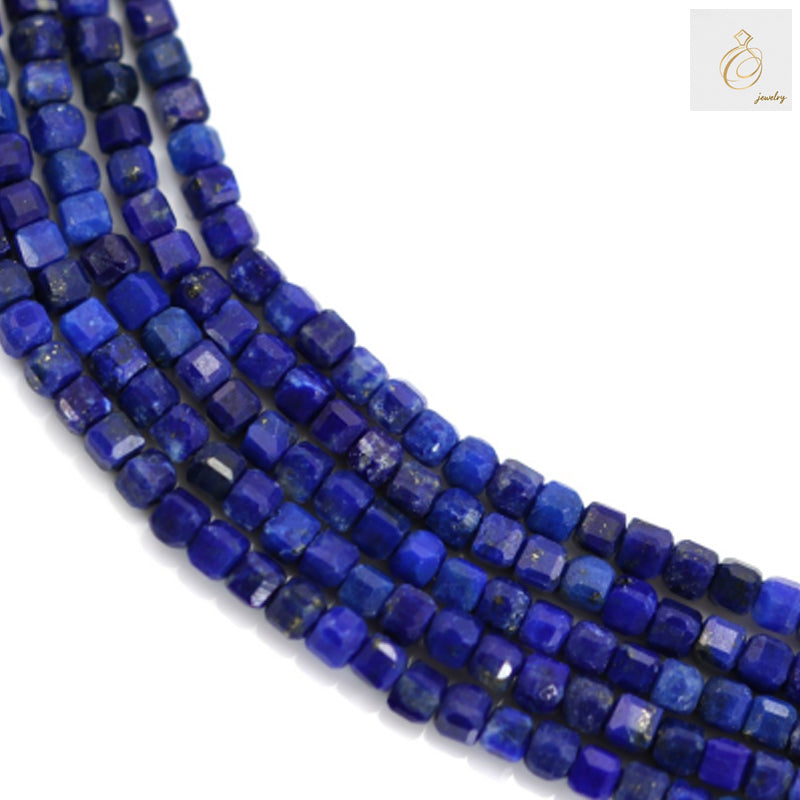 Natural lapis lazuli faceted cube beads strand showing deep blue color with golden pyrite flecks