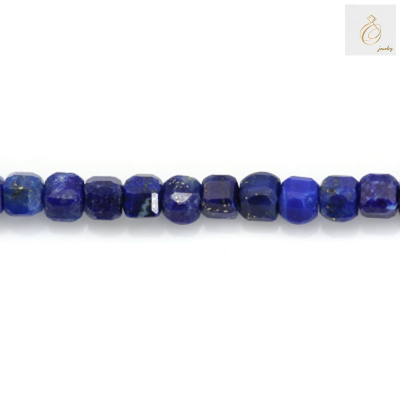 Close-up of lapis lazuli cube beads showing 2mm holes and precise faceted cuts