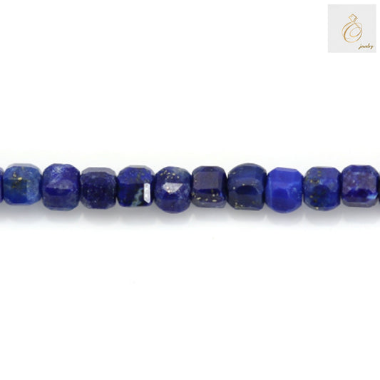 Close-up of lapis lazuli cube beads showing 2mm holes and precise faceted cuts