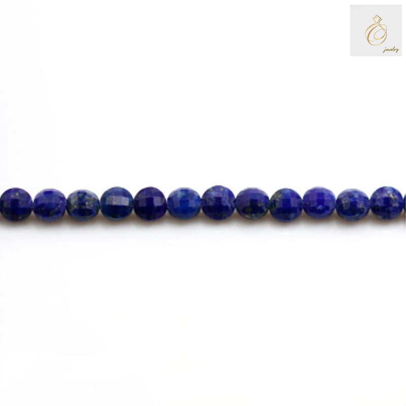Close-up view of natural Lapis Lazuli gemstone beads with faceted surface