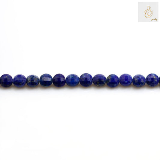 Close-up view of natural Lapis Lazuli gemstone beads with faceted surface