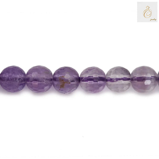 Light amethyst faceted round bead strand close-up, 6mm beads, showing transparency and faceted craftsmanship