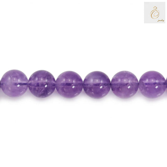 Close-up detail of 10mm light amethyst round beads showing smooth polished finish and lavender color