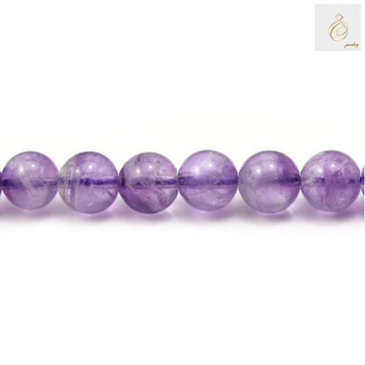 Close-up view of premium light amethyst beads displaying natural purple color and smooth round cut finish