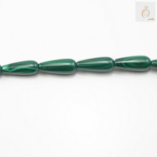 Natural malachite drop beads 7x15mm with green patterns on white background"
"Close-up of malachite gemstone beads showing natural green striations"
"Strand of polished malachite drop beads for jewelry making