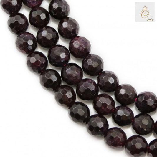 Natural garnet beads strand, 6mm faceted round gemstones, deep red color"
"Close-up of natural garnet beads showing faceted cut and rich red color