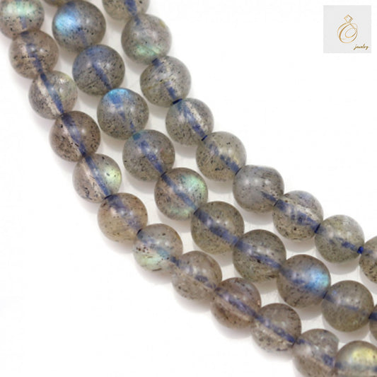 Natural labradorite round beads 4mm diameter with 0.8mm holes, approximately 100 beads per strand"
"Close-up of natural labradorite gemstone beads showing blue and green color flash