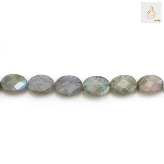 Natural labradorite gemstone beads arranged in a strand, featuring faceted oval cuts in 6x8mm size with characteristic blue-green iridescent flash and natural color variations