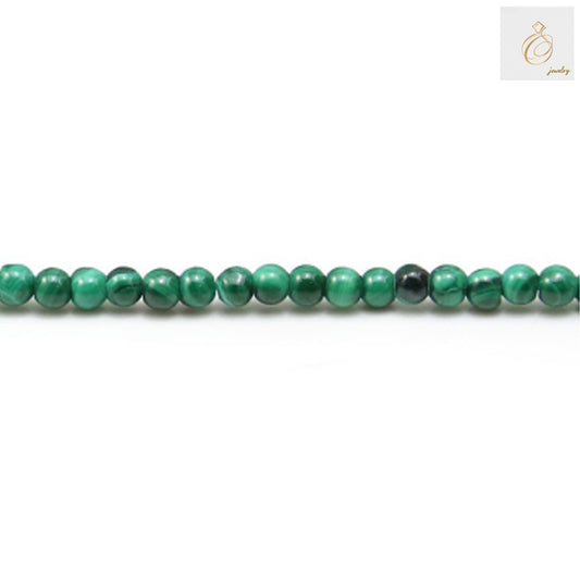 Natural malachite round beads 3mm diameter strand for jewelry making"
"Green malachite gemstone beads 132 pieces per strand"
"Close-up of natural malachite beads showing green patterns and round shape