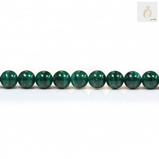 Natural malachite beads strand, 8mm round green gemstone beads with distinctive banding patterns"
"Close-up of natural malachite beads showing rich green color and unique stone patterns"
"8mm round malachite beads for jewelry making, displaying natural green variations